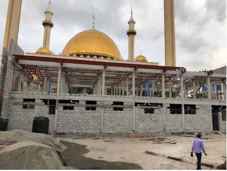 Construction-stage photograph of the National Mosque Shopping Complex in Abuja